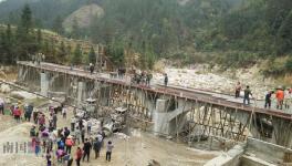 柳州魚(yú)峰水泥送80噸水泥支持村民建大橋